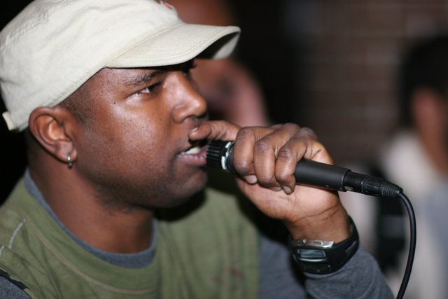 Singer Steve J with Green Shirt Performing