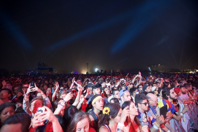 Concertgoers capture the night sky