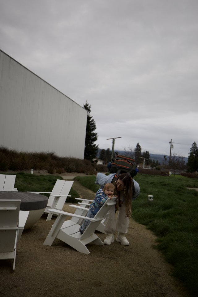 Playful Mother and Child Moment at Outdoor Venue