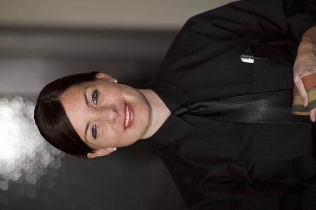 Professional Server Portrait in Black Uniform