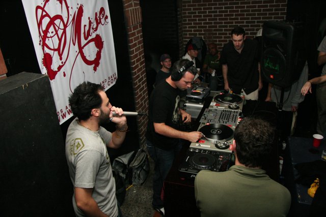 DJ Entertains Crowd in Urban Pub