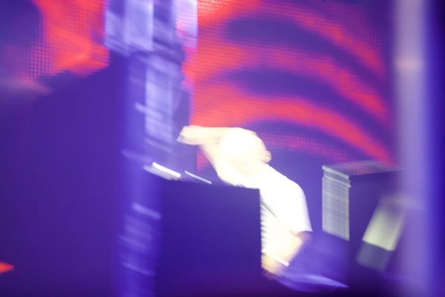 Blurred Performer on Lit Stage