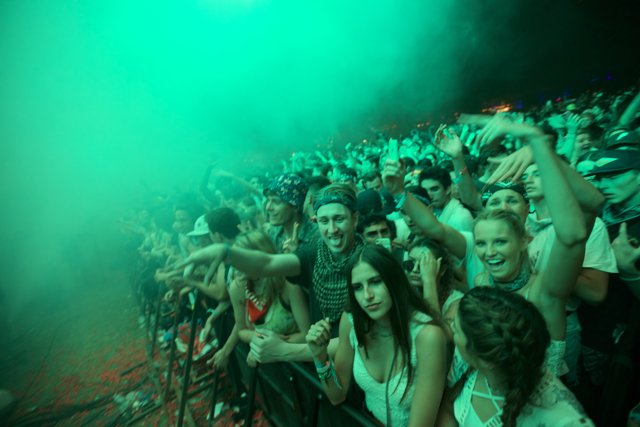 Smoke-filled Urban Concert Crowd