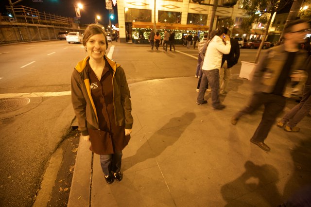 Smiling Woman on City Sidewalk Election Night 2008