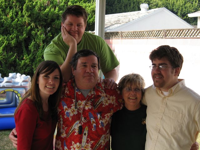 Family Christmas Gathering in Backyard Setting