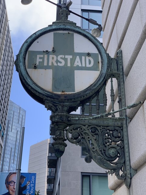 First Aid Sign on Office Building