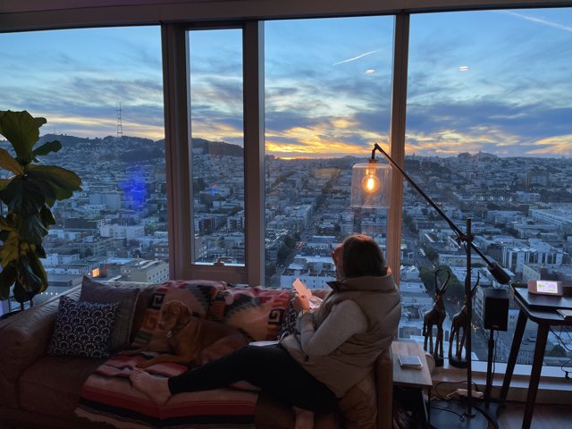 Urban Sunset from a Cozy Living Room