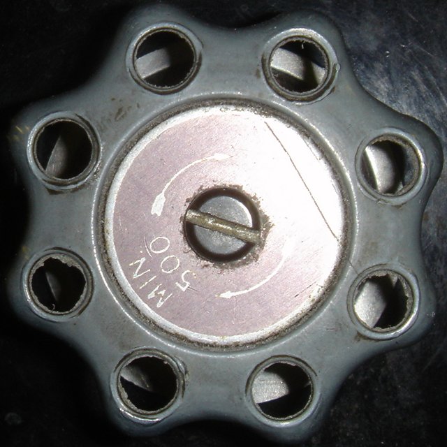 Close-Up of Metal Wheel with Holes