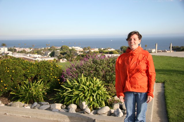 Smiling Woman Overlooking Coastal California Town