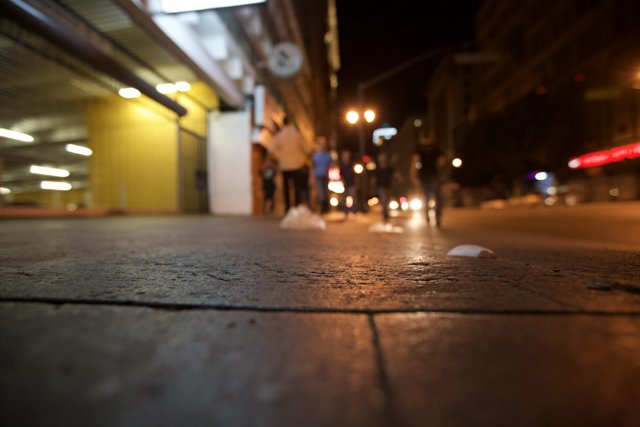 Nighttime Stroll on the City Sidewalk