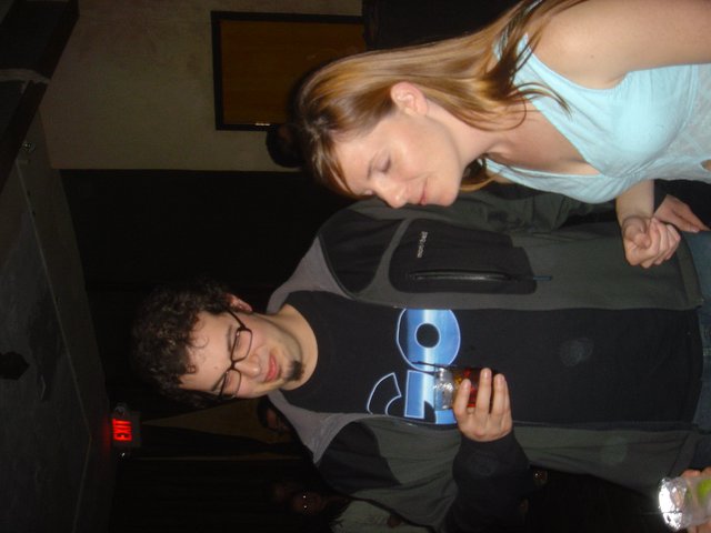 Two Friends at a Dimly Lit Venue 2005