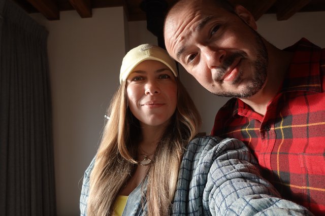 Happy Couple Taking Indoor Selfie Together