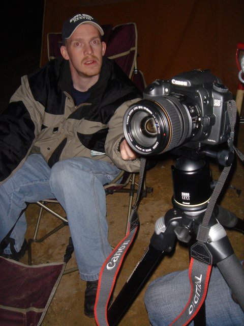 Man with Camera and Tripod