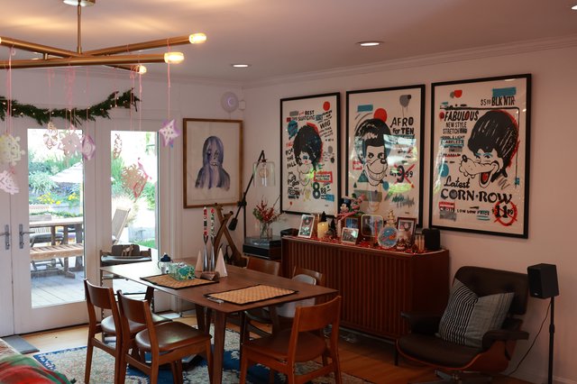 Mid-Century Modern Dining Room with Pop Art Posters