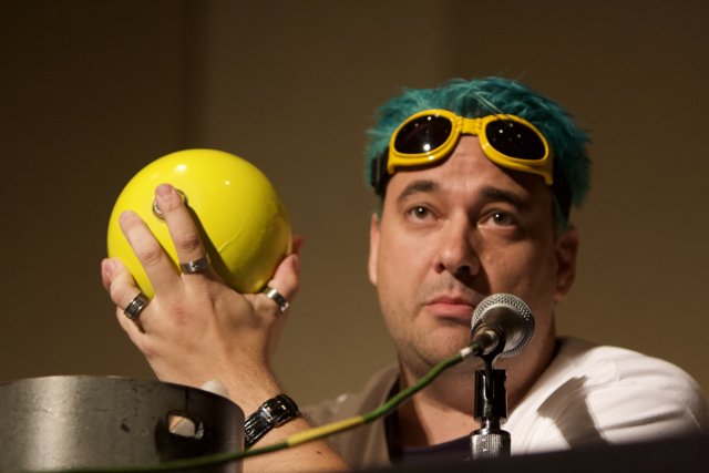Blue-haired Man with Yellow Balloon