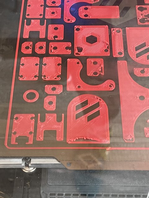 Assorted Parts on a Red Sheet