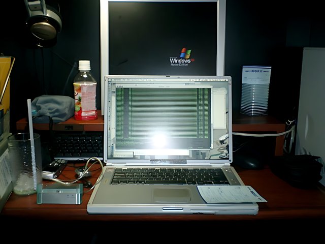 Two Laptops on Desk with Accessories