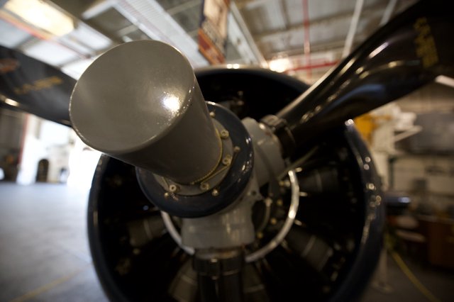 Close-Up of Vintage Aircraft Propeller Hub in Hangar