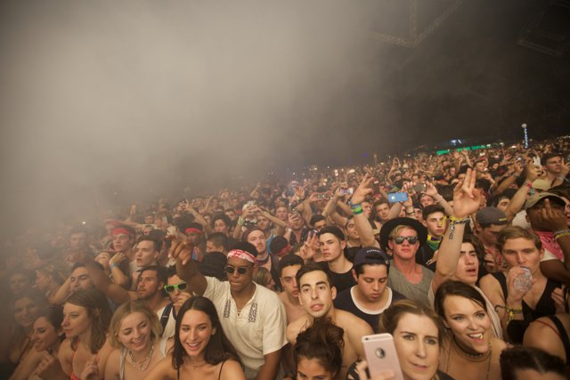 Smoke and Sound: A Concert Crowd Captured
