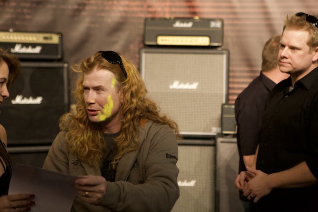 Dave Mustaine Performs with a Female Guitarist