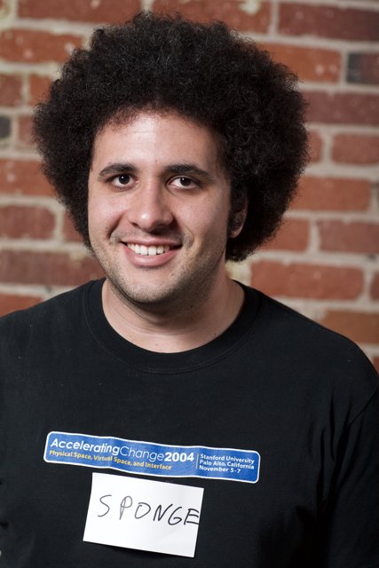 A Smiling Man in Black T-Shirt