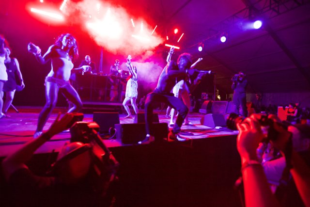 Red-Lit Group Performance at Coachella