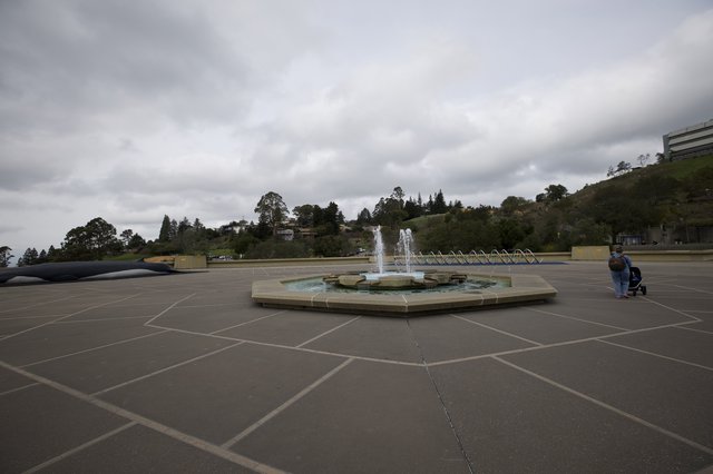 Fountain Plaza on Overcast Day with Distant Hills