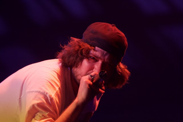 Cap-wearing Singer Takes Coachella Stage