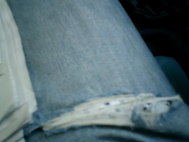 Worn and Loved: A Close-Up of Distressed Jeans