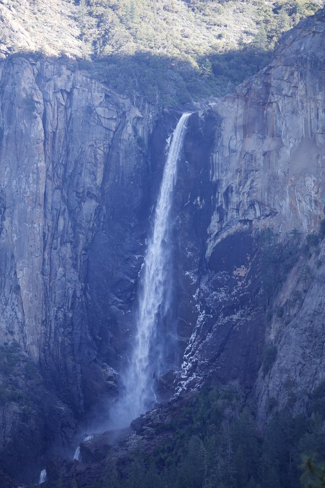 Yosemite Falls Cascading Through Granite Cliffs in Winter