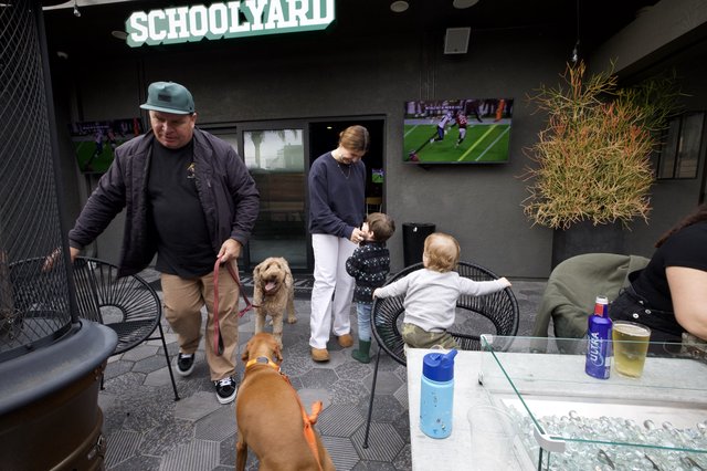 Family Outing at Dog-Friendly Sports Bar Patio