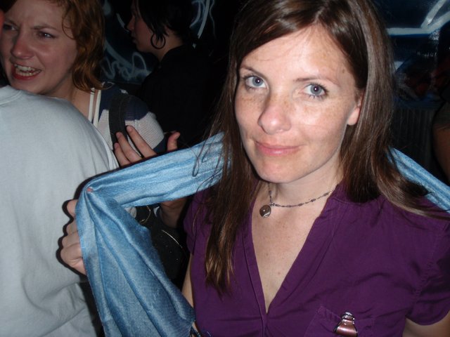 Two Women Socializing at a Nightclub Event