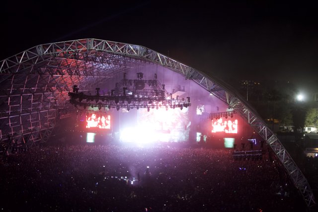 Nighttime Concert Crowd on a Large Stage