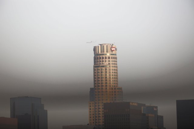 Timeless Skyscraper in Foggy Metropolis