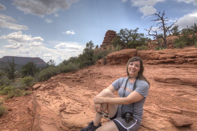 Hiker Resting on Red Rock Formations in Sedona