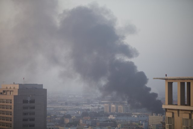 Smoke engulfs Iraqi Consulate in Cityscape