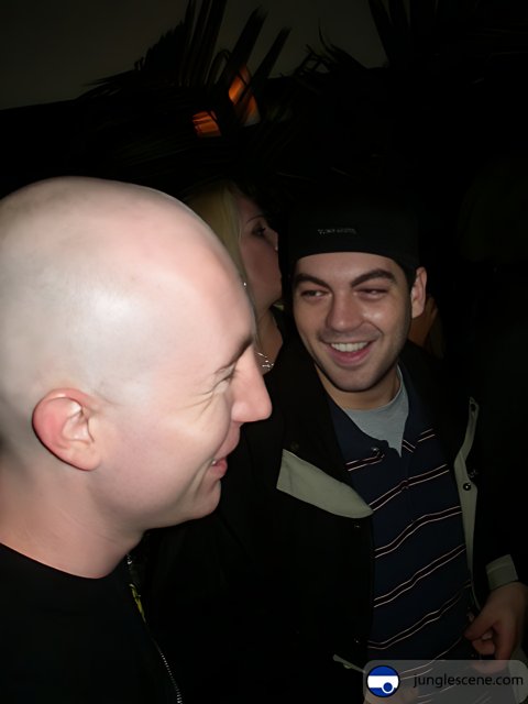 Smiling Bald Man at Party
