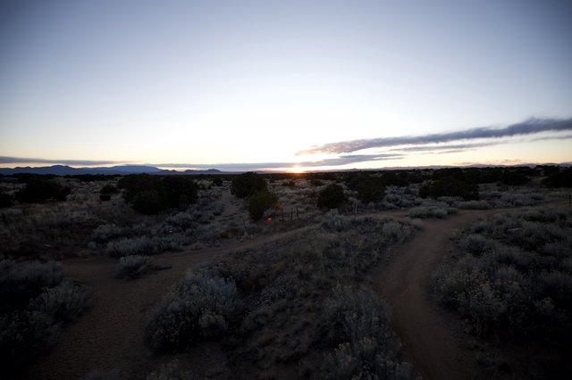 Desert Sunset Over Sagebrush Trail in New Mexico