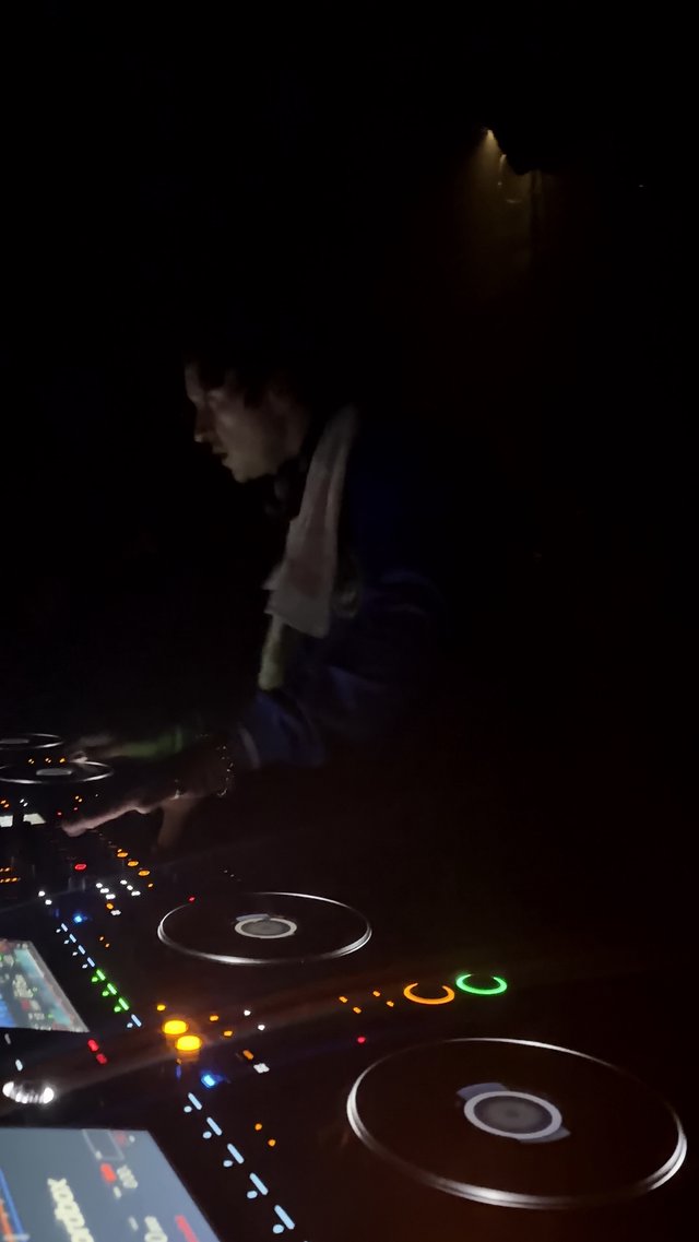 DJ Performing with Professional Pioneer Controller in London