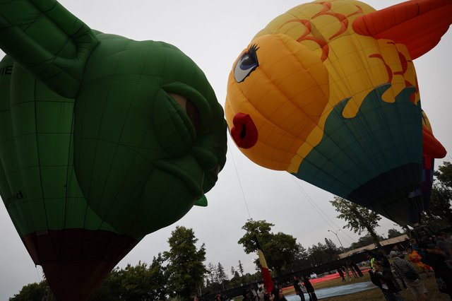 Giant Character Balloons Face Off at Festival