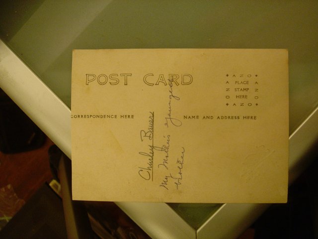 Handwritten Note on Postcard