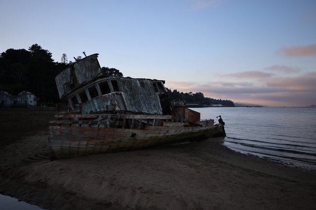 Abandoned Shipwreck at Dusk on California Coast