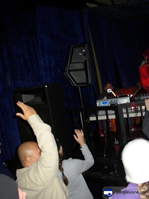 Red Costume DJ Takes Over Night Club