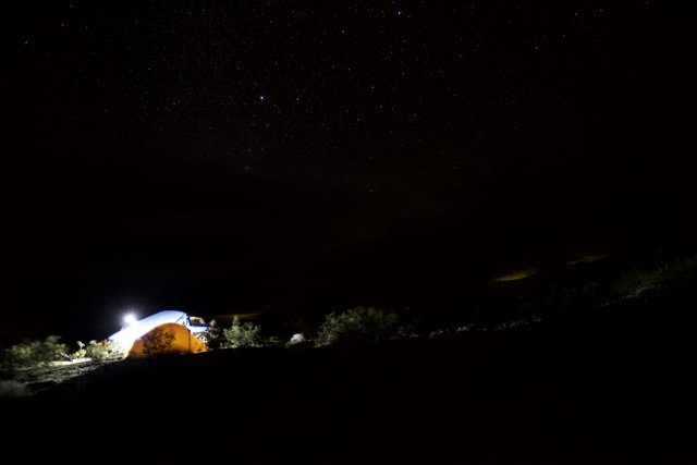 Mountain Tent Under Starry Night Sky