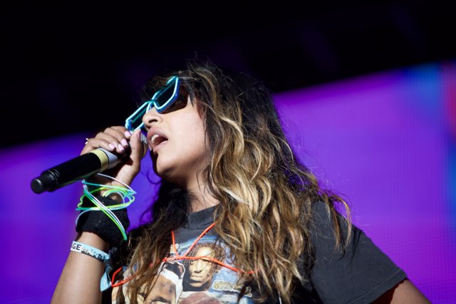 Coachella Spotlight: Sunglass-Wearing Singer Rocks the Stage