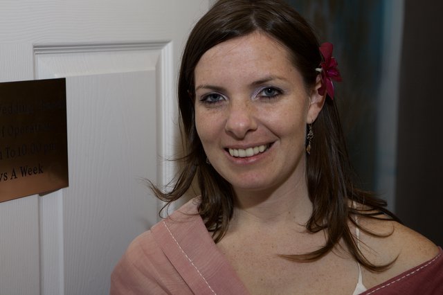 Smiling Bridesmaid With Flower in Her Hair