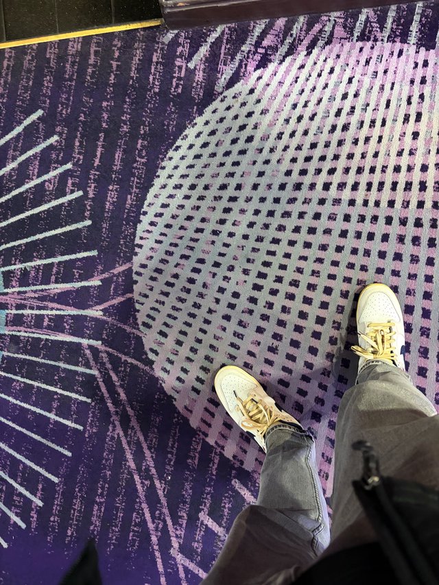 Standing on Abstract Purple Carpet with Halftone Pattern