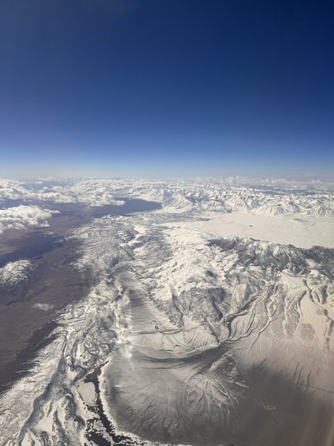Frozen Peaks from the Skies Above