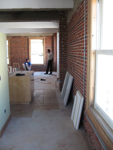 Working on the Flooring in a Building