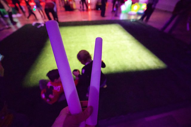 Purple Glow Sticks at Baby Rave Dance Event